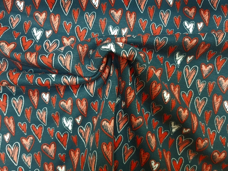 Baumwoll-Jersey von Stenzo mit roten Herzen auf dunkelblau